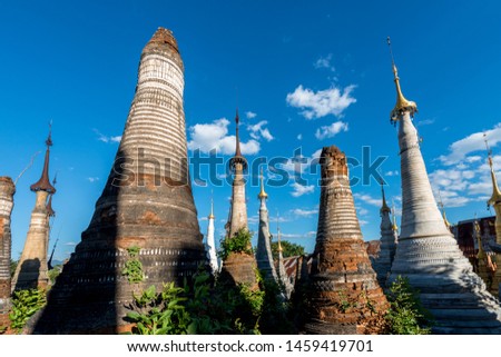 Horizontal picture of local vegetation with different  architecture stupas at Indein Temple, landmark of Inle Lake, Myanmar