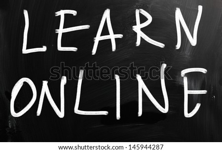 "Learn online" handwritten with white chalk on a blackboard