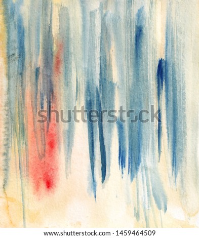 The texture of strokes of watercolor paint blue, orange and yellow. Dry brush. Handmade texture.