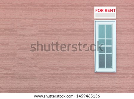 Modern windows and Detail of house exterior red wall.