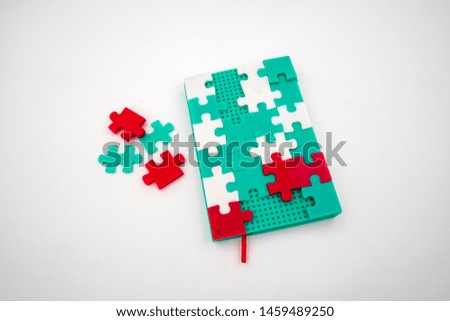 Creative soft silicone puzzle rainbow color notebook isolated on white background