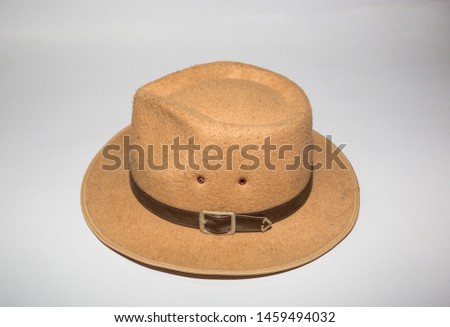 Brown hat and white background