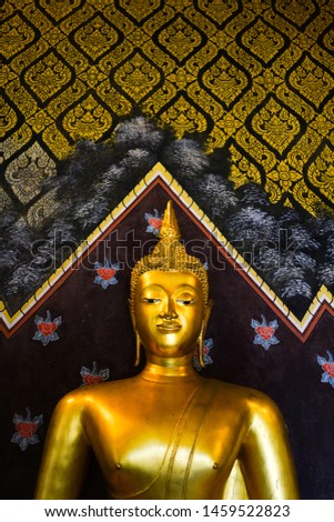 buddha and Thai floral pattern on the wall