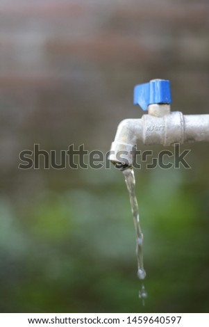 Tap water for the background, water drips and flows