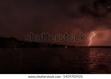 Night lightning over the lake. Kiev region. 24/05/2019
