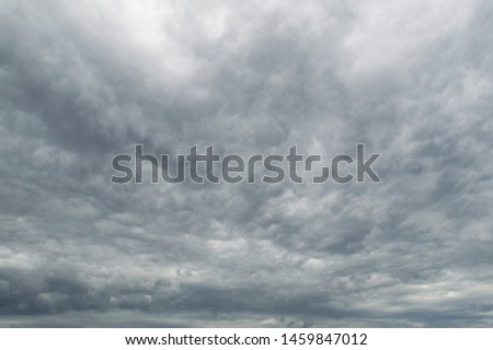 Dark sky with grey clouds