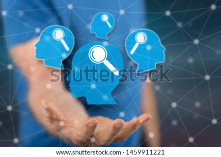 Analysing concept above the hand of a man in background