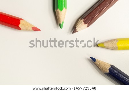 Colorful pencils isolated on white. drawing supplies