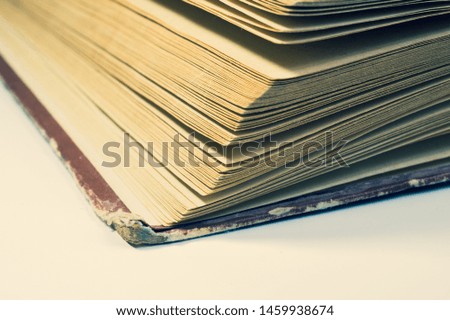 Detail of the book isolated on white background. lines of the book pages