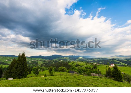 A small village Yablunitsa in the Carpathians. Royalty-Free Stock Photo #1459976039