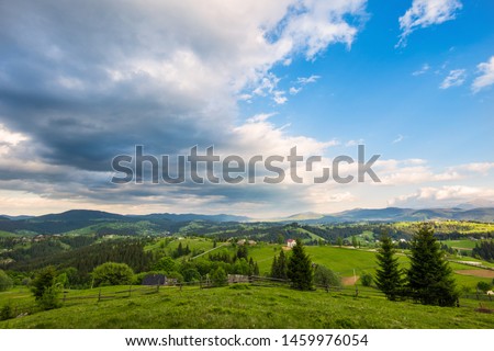 A small village Yablunitsa in the Carpathians. Royalty-Free Stock Photo #1459976054