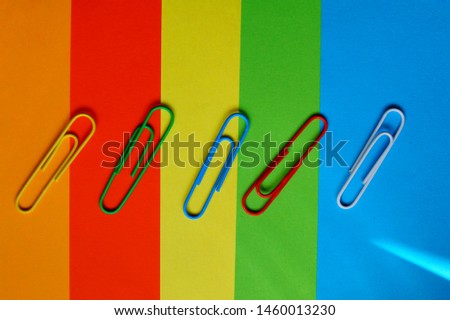 Paper clips. School and office accessories. Colored paper and  clips.