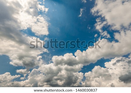 Сlouds in the blue sky. Royalty-Free Stock Photo #1460030837