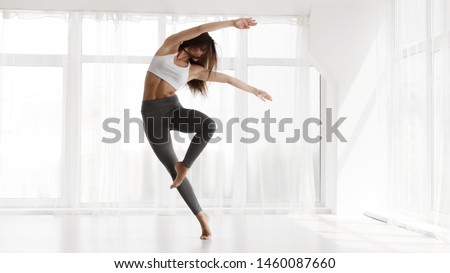 Pretty Girl Dancing Contemp and Ballet In Modern Dance Studio. Panorama, Empty Space for text