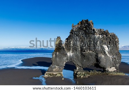Hvitserkur - iconic sea stack on volcanic black beach, Iceland