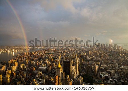 Manhattan skyline with rainbow New York City from top of the Empire States Building