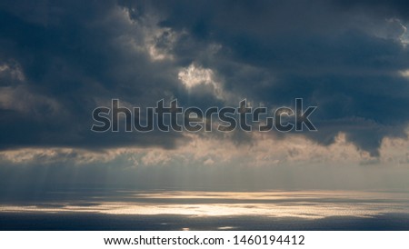 Dramatic Clouds and Sun rays Mediterranean Sea