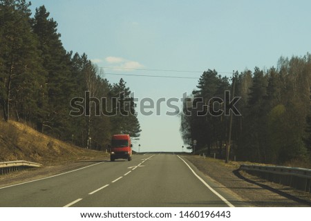 Car driving on a highway. auto moving on a roadway background