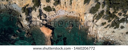 Panoramic view directly from above Palma de Mallorca rocky seaside coves turquoise colored Mediterranean Sea waters, nature background, Balearic Islands, Spain