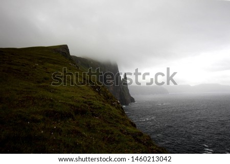 Trollkonfungurin in fog, Faroe Islands