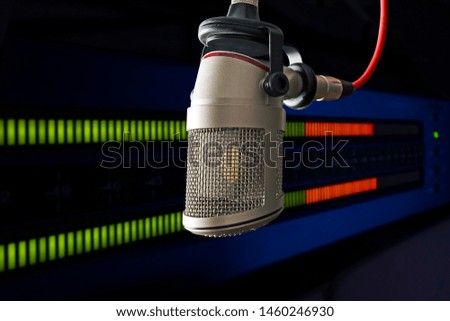 Professional microphone and volume level indicator