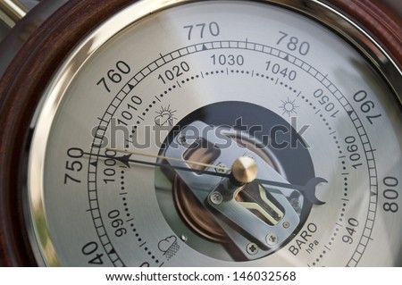 Barometer indicating atmospheric pressure reduction Royalty-Free Stock Photo #146032568