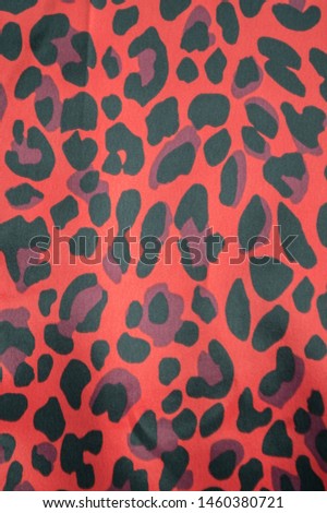 beautiful texture of red fabric imitation leopard