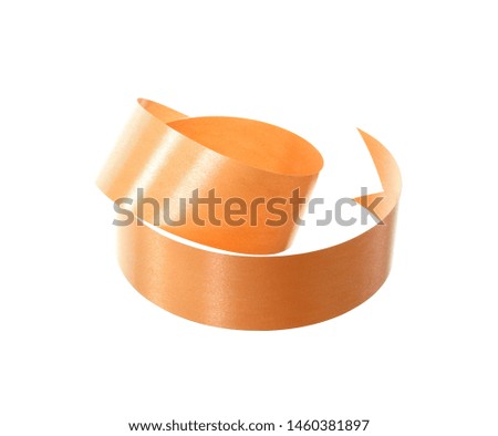 Orange ribbon roll isolated on white background.