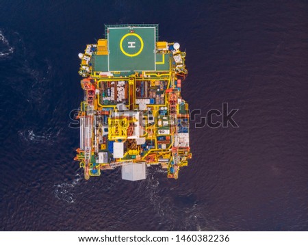 Offshore oil rig for installation sea for repairs, aerial top view.