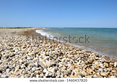 A stony beach on a beautiful summer day