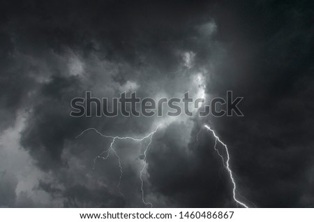 Strong lightning in scary black clouds in monsoon season