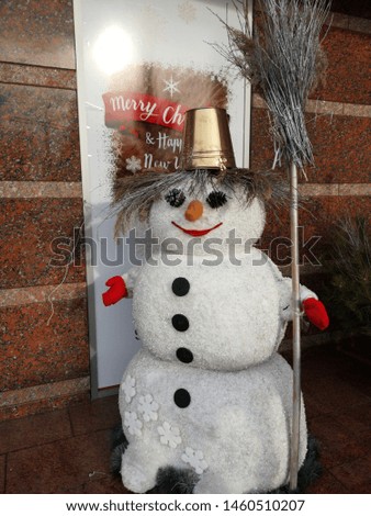 happy snowman holding blank banner, winter background, Christmas greeting card