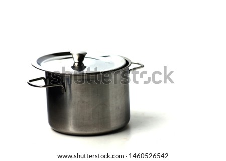 metal saucepan isolated on white background. Image contains copy space
