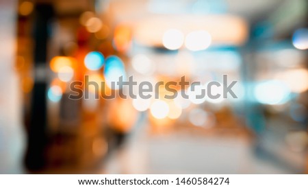 Blurred image of interior in shopping mall for background.