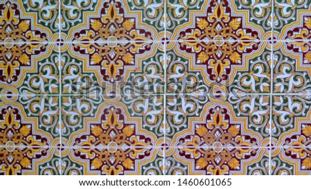 Colorful ceramic tiled corner of wall finish in village in Andalusia