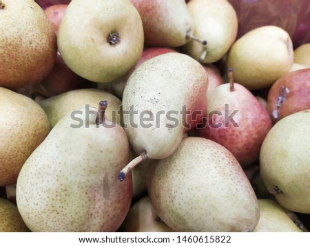 Macro Photo food fruit green pears. Texture background of fresh green pears. Limited depth of field. Image of fruit product pears