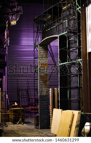 
scenery behind the scenes in the theater of opera and ballet. large metal structures Royalty-Free Stock Photo #1460631299