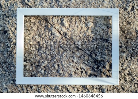 White wood frame On the rock
