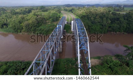 double track train bridge seen from above using a drone camera