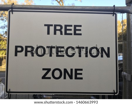Tree Protection Zone sign mounted on a fence to preserve the environment. Environmental protection to save our planet.