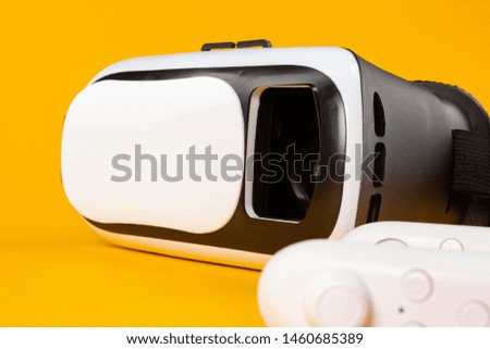 VR Headset on color table background