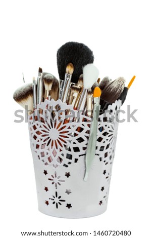 makeup artist brushes are in a beautiful box on the table at the master makeup
