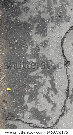 texture and background of old asphalt after rain