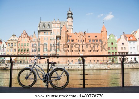 retro bicycle stand near river in old gdansk city	