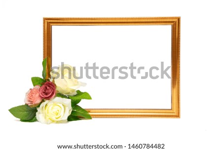 Vintage gold colored wooden frame and beautiful flowers.  Mock up template with copy space for text.  White background. 