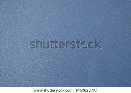 A blue metal style wall background and texture.