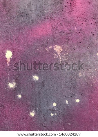 Abstract colorful textured background with contrasting stains.
