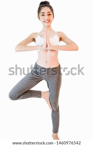 Exercise,Young beautiful asian woman wearing a white tank top,Yoga on white background
