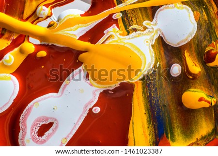 abstract background of water-based colored paint-stripes,drops 