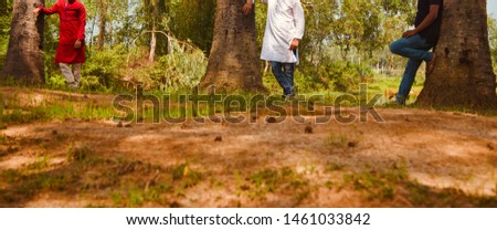 Young men standing around a place isolated unique photo